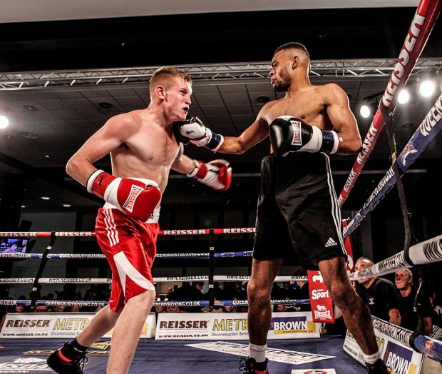 Streatham Guardian: Take that: Anthony Ayinde, right, lands one on Ashley Dansie in their first meeting last year Streatham Guardian: Take that: Anthony Ayinde, right, lands one on Ashley Dansie in their first meeting last year