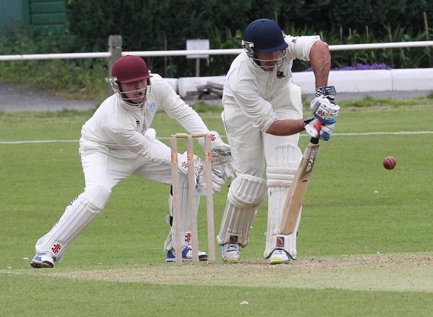 Streatham Guardian: Keep that out: Richmond's Andrew Lowe frsutrates the bowling during his 125-ball 45 against Teddington Streatham Guardian: Keep that out: Richmond's Andrew Lowe frsutrates the bowling during his 125-ball 45 against Teddington