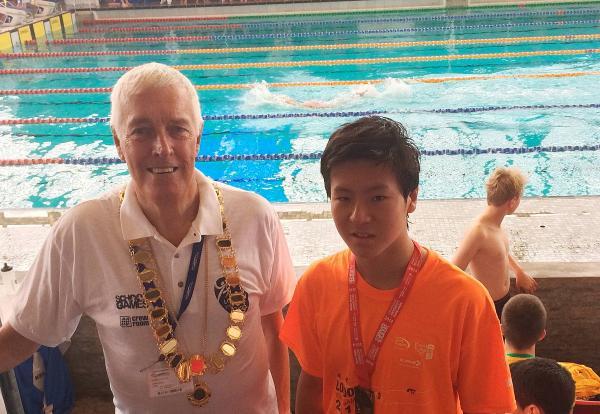 Streatham Guardian: Golden moment: Kingston's Issei Kuzuki with Middlesex County ASL president Tony Burton Streatham Guardian: Golden moment: Kingston's Issei Kuzuki with Middlesex County ASL president Tony Burton