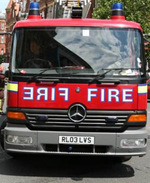 Firefighter injured in fire engine crash